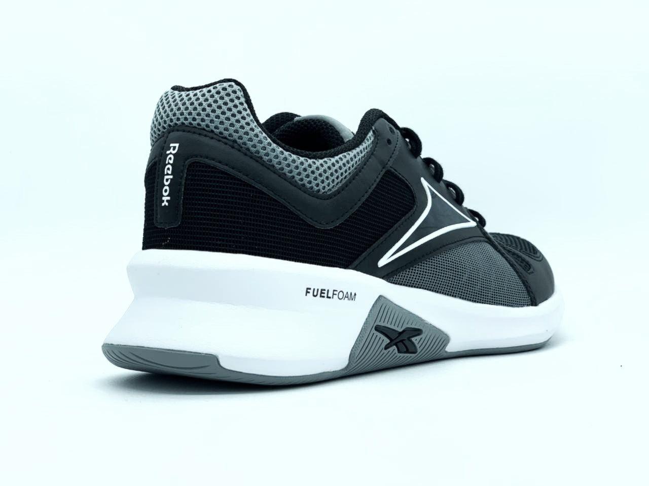 Oferta de Tenis Reebok Advance Trainer Para Caballero Negro con envío gratis- SPORTLAND MX
