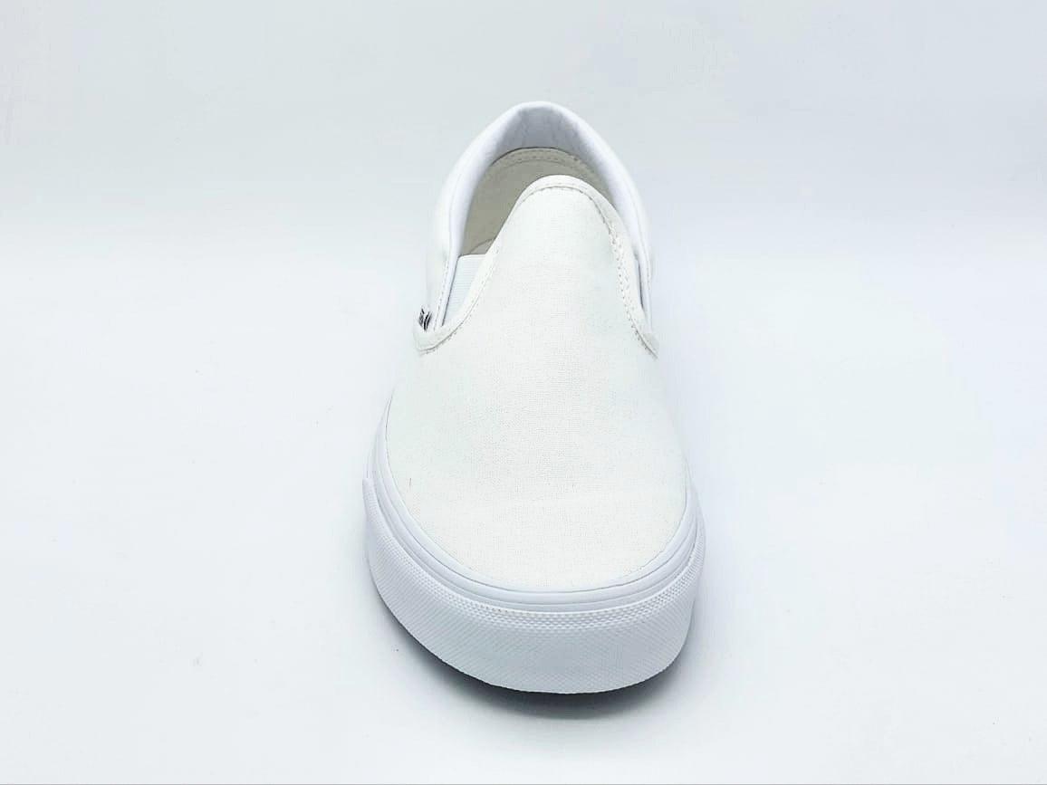 Oferta de Tenis Vans Slip -On  Para Caballero Blanco con envío gratis- SPORTLAND MX